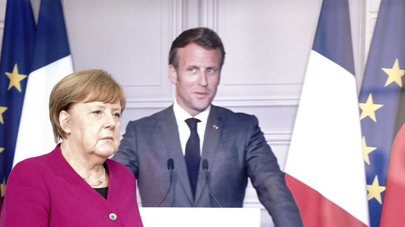 Kanzlerin Angela Merkel und Präsident Emmanuel Macron üben den (virtuellen) Schulterschluss.