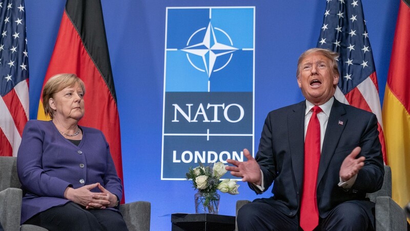 Bundeskanzlerin Angela Merkel und US-Präsident Donald Trump geben sich zum Abschluss des Nato-Gipfels ungewohnt harmonisch.
