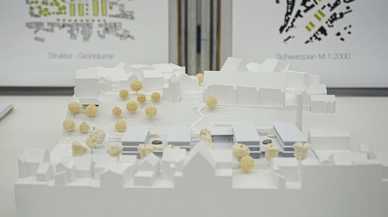 Blick über den visualisierten Entwurf auf die obere Stadt.