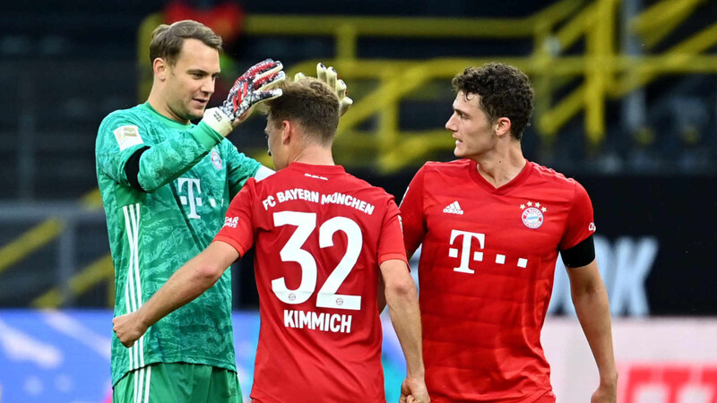 Die Bayern-Spieler Manuel Neuer (l.), Joshua Kimmich (m.) und Benjamin Pavard jubeln nach dem Sieg gegen den BVB. Ist ihnen die Meisterschaft noch zu nehmen?