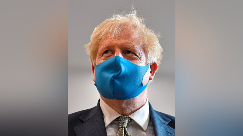 Premierminister Boris Johnson rät nun zum Schutz von Mund und Nase.