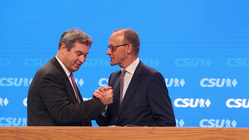Lässt CSU-Chef Markus Söder (l.) diesmal Friedrich Merz (r.) den Vortritt ? Vertraute von Merz haben sich schon positioniert.