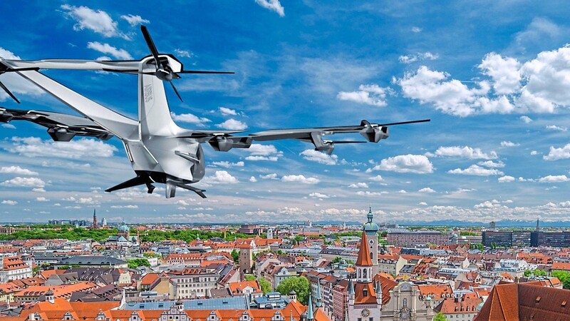 In einer Computeranimation fliegt das Airbus-Flugtaxi, der City-Airbus Next Generation, schon über München.
