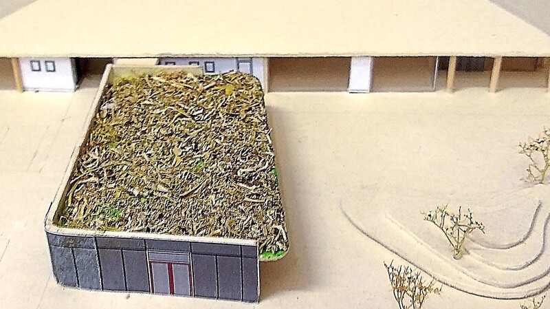 Das Modell zeigt den Außenanbau mit Gründach.