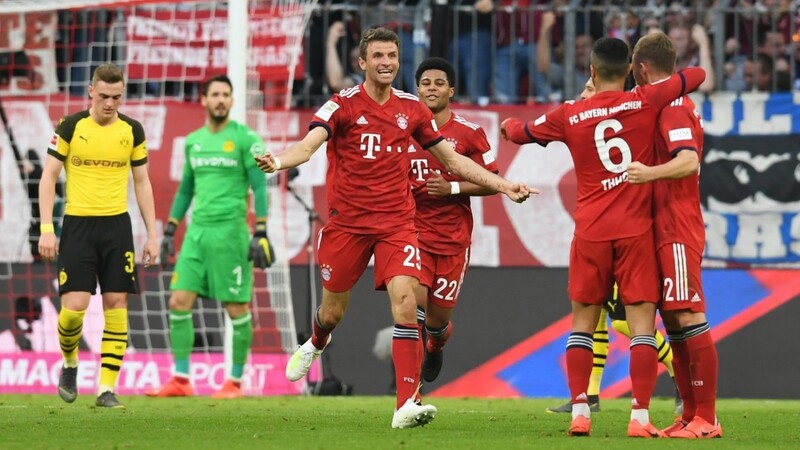 Die Bayern bejubeln einen klaren Sieg im Top-Spiel gegen Borussia Dortmund.