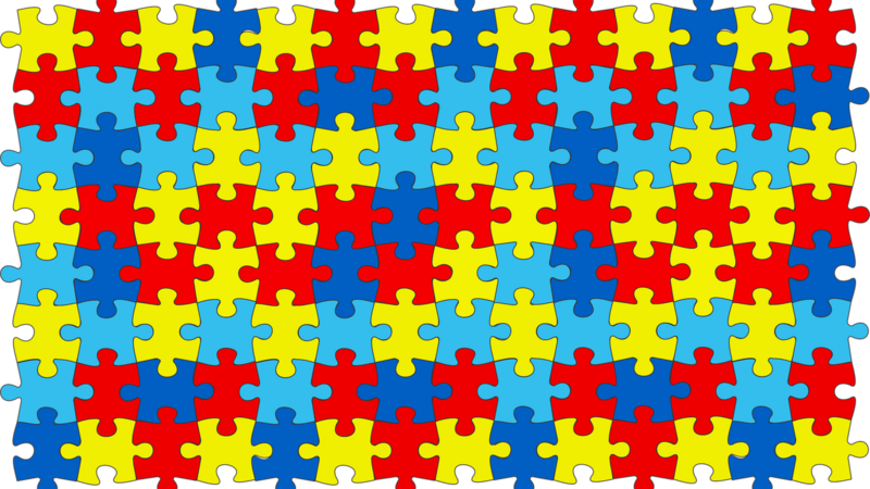 Bunte Puzzleteile sind ein weit verbreitetes Zeichen für Autismus. Sie stehen für viele Aspekte der Störung, wie zum Beispiel den Detailblick von Betroffenen, die Komplexität und die Vielfalt von Autismus.