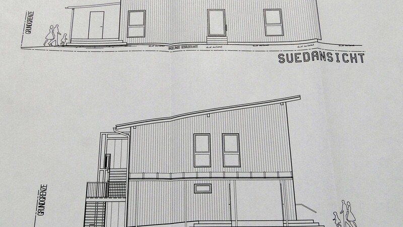Den Bauplan für das massive Holzschulhaus gibt es schon.