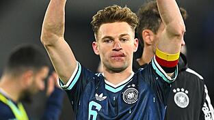 Joshua Kimmich feiert mit einer Verletzung an der Lippe den Sieg in der Schweiz. Joshua Kimmich feiert mit einer Verletzung an der Lippe den Sieg in der Schweiz.