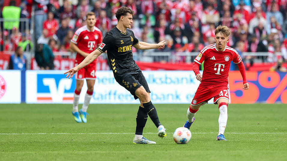 Eric Martel (l.) bei der Partie in München am 34. Spieltag (rechts Bayerns Lennart Karl). Eric Martel (l.) bei der Partie in München am 34. Spieltag (rechts Bayerns Lennart Karl).