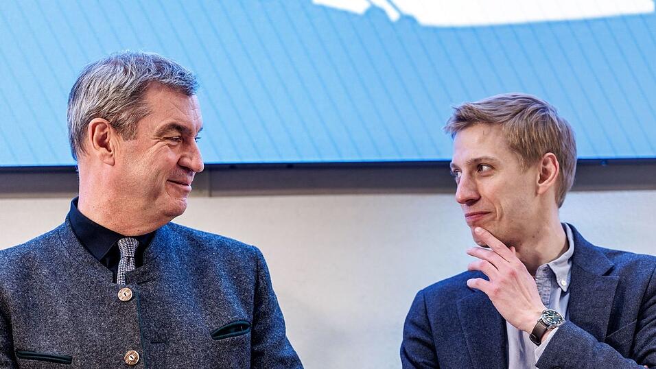 Ministerpräsident Söder und Oberbürgermeister Krause werben für München als Olympiastadt. (Archivbild) Ministerpräsident Söder und Oberbürgermeister Krause werben für München als Olympiastadt. (Archivbild)