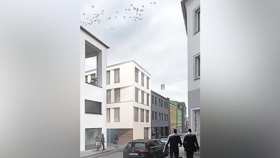 An der Ecke zum Schrödergäßchen findet der Neubau von Kreitinger und Maierhofer seinen Platz. Dahinter ist - mit der dunklen Fassade - das bereits bestehende Gebäude zu sehen. An der Ecke zum Schrödergäßchen findet der Neubau von Kreitinger und Maierhofer seinen Platz. Dahinter ist - mit der dunklen Fassade - das bereits bestehende Gebäude zu sehen.