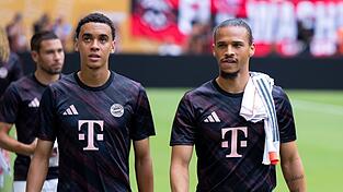 Jamal Musiala (l) und Leroy Sané waren beim FC Bayern lange Teamkollegen.