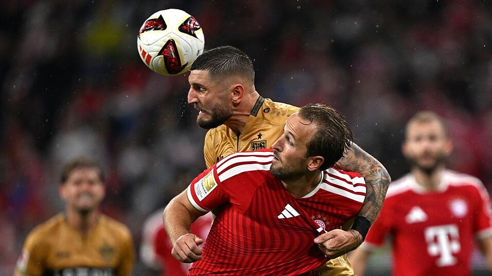 Harry Kane (vorne) in Aktion gegen Stuttgart. Harry Kane (vorne) in Aktion gegen Stuttgart.
