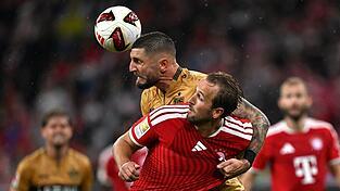 Harry Kane (vorne) in Aktion gegen Stuttgart. Harry Kane (vorne) in Aktion gegen Stuttgart.