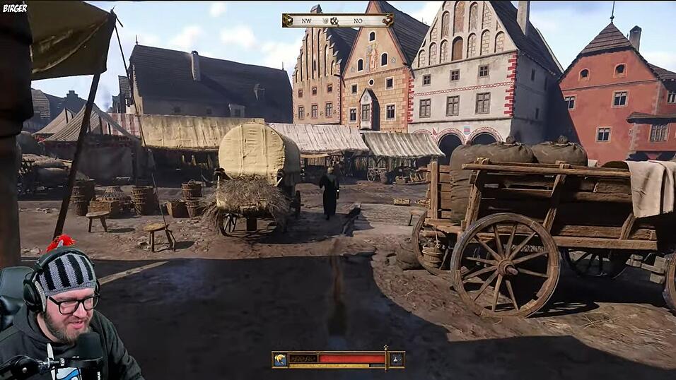 In 'Kingdom Come: Deliverance 2' bewegt man sich in der Ego-Perspektive - einer subjektiven Kameraperspektive, die der Spieler selbst steuert - durch ein virtuelles B&ouml;hmen im Jahr 1403 (hier die Stadt Kuttenberg). Wenn Birger streamt, sind um die 1.000 Zuschauer live dabei.