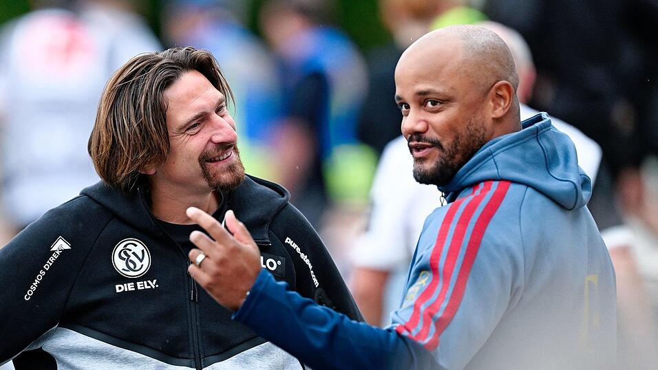 Bayern-Trainer Vincent Kompany (r) würde in der nächsten Saison gern wieder nach Elversberg kommen. Bayern-Trainer Vincent Kompany (r) würde in der nächsten Saison gern wieder nach Elversberg kommen.