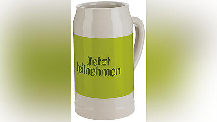 Das Motiv des offiziellen Volksfestkrugs 2026 ist „Volksfestauszug“. Jeder kann seine Idee einbringen.