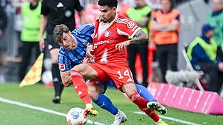 Wiedersehen im Testspiel: Heidenheims Luca Kerber (l) und Luis Díaz vom FC Bayern. (Archivbild) Wiedersehen im Testspiel: Heidenheims Luca Kerber (l) und Luis Díaz vom FC Bayern. (Archivbild)