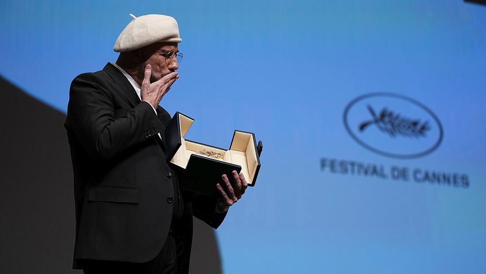 John Travolta wurde mit der Goldenen Ehren-Palme &uuml;berrascht.