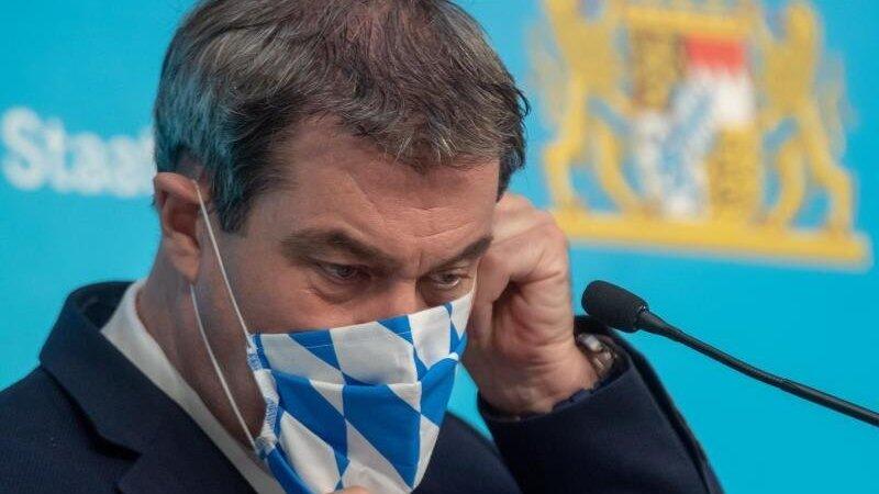 Markus Söder, der Ministerpräsident von Bayern, mit Mund-Nasen-Schutz im Bayern-Design. Foto: Peter Kneffel/dpa-Pool/dpa/Archivbild Markus Söder, der Ministerpräsident von Bayern, mit Mund-Nasen-Schutz im Bayern-Design. Foto: Peter Kneffel/dpa-Pool/dpa/Archivbild