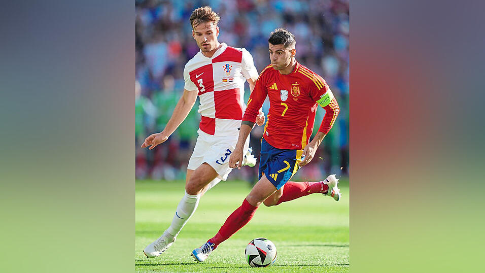 Pongracic (l.) trat bei der EM gegen Stars wie Spaniens Alvaro Morata an.