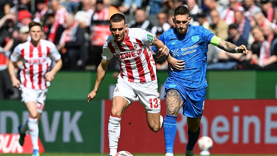 Rivalen am Rhein: K&ouml;lns Said El Mala (l) und Robert Andrich von Bayer Leverkusen.