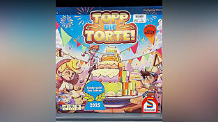 „Topp die Torte“ ist das Kinderspiel des Jahres und Erwachsene bauen gerne Lego-Blumen. „Topp die Torte“ ist das Kinderspiel des Jahres und Erwachsene bauen gerne Lego-Blumen.