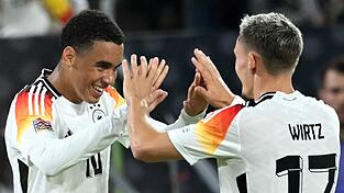 Im Nationalteam Mitspieler, in der Liga Gegner: Jamal Musiala (l) und Florian Wirtz