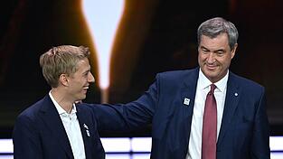 München mit Oberbürgermeister Dominik Krause (Grüne, l) und dem Ministerpräsidenten Markus Söder (CSU, r) hatte deutlich die Nase vorn. München mit Oberbürgermeister Dominik Krause (Grüne, l) und dem Ministerpräsidenten Markus Söder (CSU, r) hatte deutlich die Nase vorn.