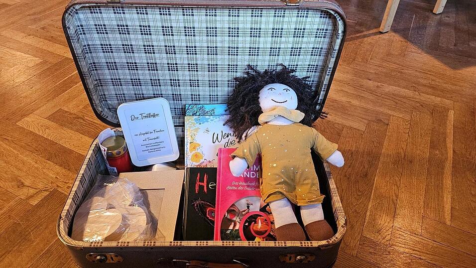 Koffer für alle Fälle: Im Trauerfall soll der Inhalt der mit Liebe gepackten Behältnisse Kindern in schweren Stunden Zuversicht spenden.