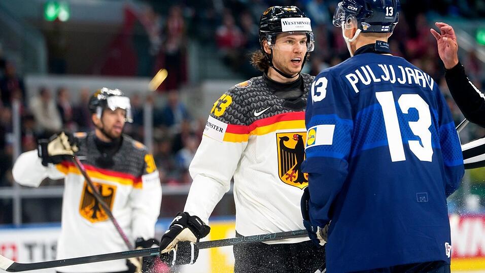 Kapit&auml;n Moritz Seider im Wortgefecht mit NHL-Kollege Jesse Puljujarvi.