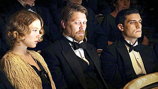 Léa Seydoux als Lizzy, Gijs Naber (Mitte) als Jacob und Louis Garrel als Dedin