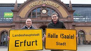 Erfurts Oberbürgermeister Andreas Horn (CDU) und Halles OB Alexander Vogt (parteilos) werben für ihre Städte.