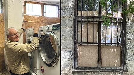 Klaus Zitzelsberger zeigt mit dem Meterstab den Fensterrahmen, wo der Einbrecher einstieg. Zuvor hatte der T&auml;ter die Eisenstangen vor dem Fenster aufgebogen und die innen zur Sicherung angebrachten Holzplatten eingedr&uuml;ckt.