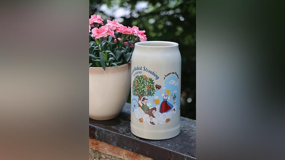 Der offizielle Volksfestkrug 2025. Das Motiv stammt aus der Feder von Wolfgang Warmdt.