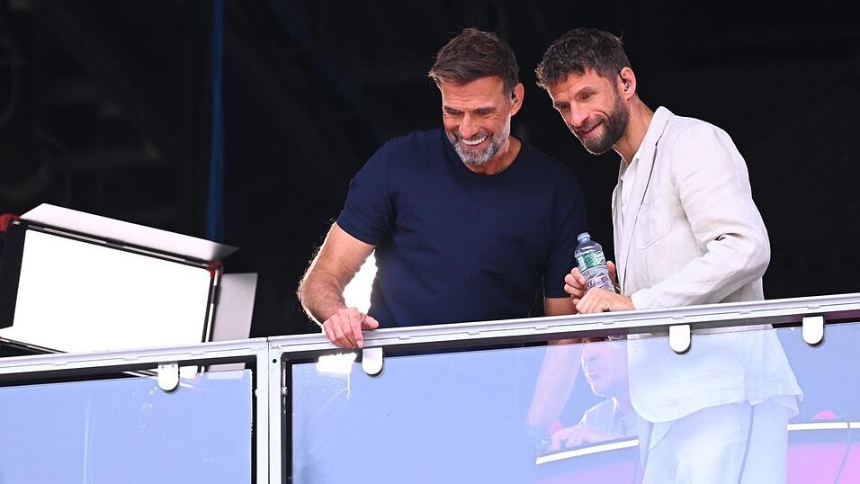 Klopp und Müller erlaubten sich auch als WM-Experten manchen Scherz. Klopp und Müller erlaubten sich auch als WM-Experten manchen Scherz.
