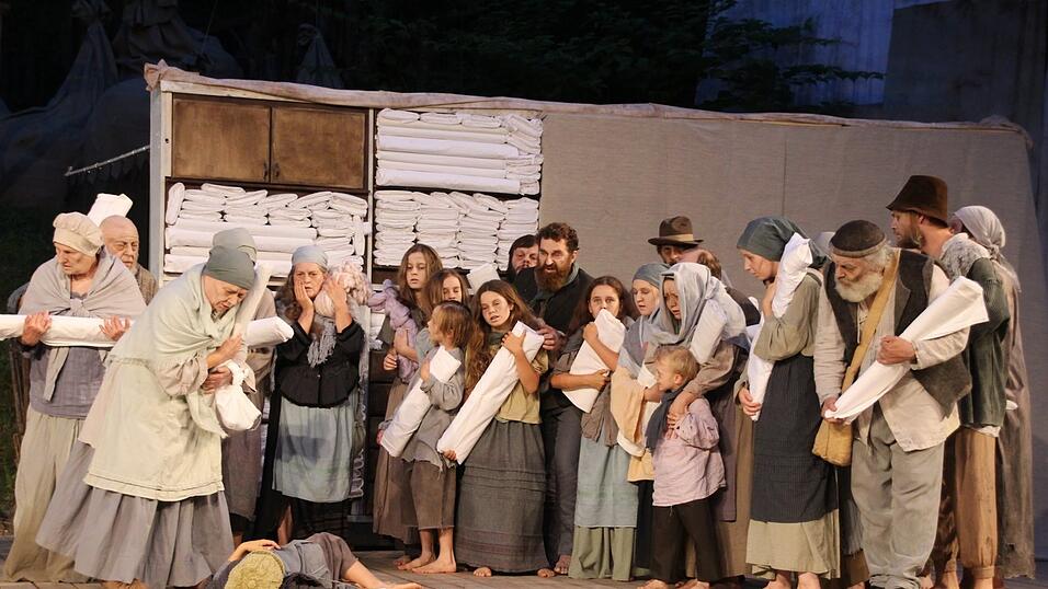 Der schwache Weberjunge br&auml;uchte ein St&uuml;ck Brot, aber keiner kann helfen.