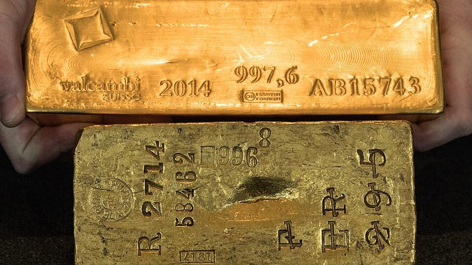 Die Bundesbank präsentiert Goldbarren, die sie aus dem Ausland in eigene Tresore nach Frankfurt geholt hat. (Archivbild) Die Bundesbank präsentiert Goldbarren, die sie aus dem Ausland in eigene Tresore nach Frankfurt geholt hat. (Archivbild)