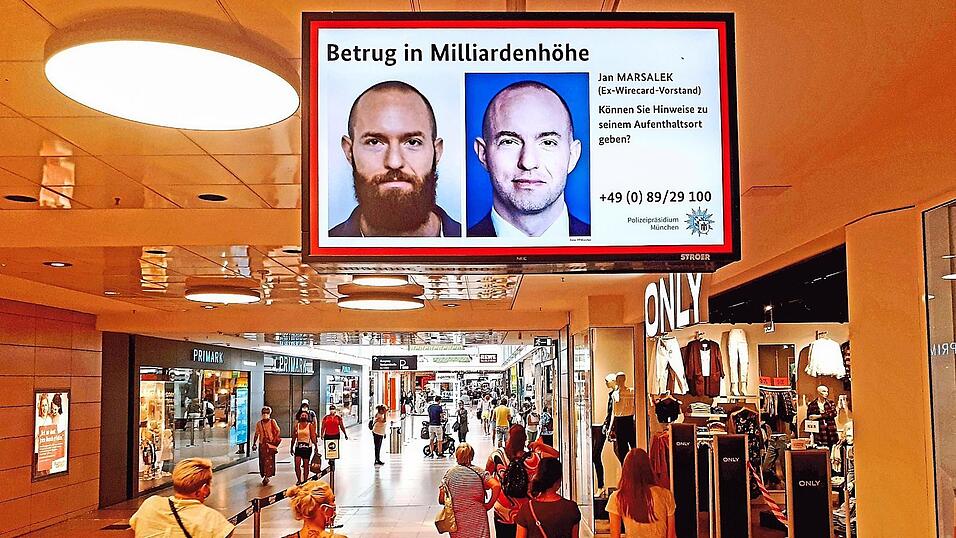 Nach dem flüchtigen Wirecard-Manager Jan Marsalek wird seit Jahren gefahndet - wie etwa auf Werbetafeln in einem Hamburger Einkaufszentrum. Nach dem flüchtigen Wirecard-Manager Jan Marsalek wird seit Jahren gefahndet - wie etwa auf Werbetafeln in einem Hamburger Einkaufszentrum.