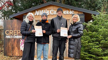 Natalie Dietzsch-Albrecht (von links), Jeremy Hüttner, Valentin Weber und Elisabeth-Maria Bauer hoffen, dass auch beim zweiten „Landshut singt!“ wieder viele Hundert Teilnehmer in den „Glühgarten“ kommen.