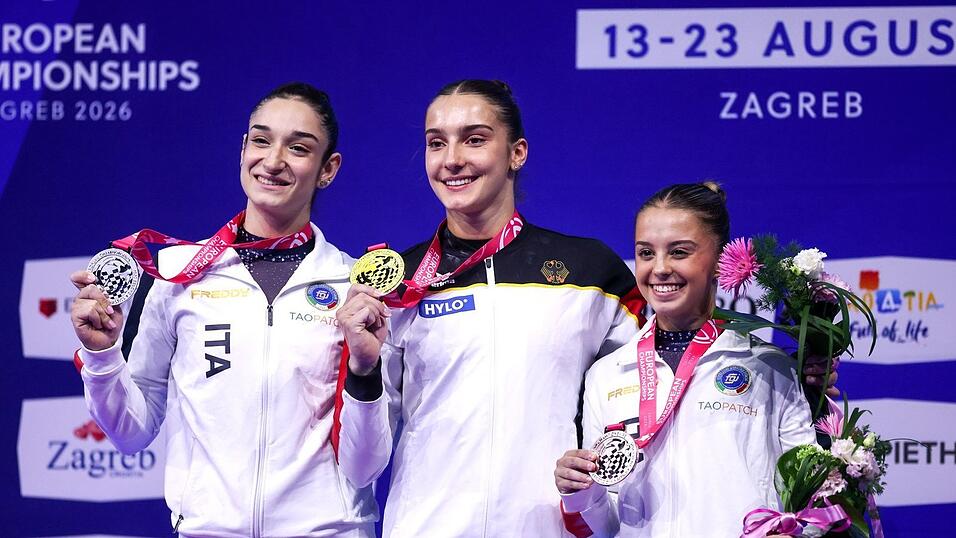 Stolzes Lächeln: Helen Kevric mit ihrer Goldmedaille. Stolzes Lächeln: Helen Kevric mit ihrer Goldmedaille.