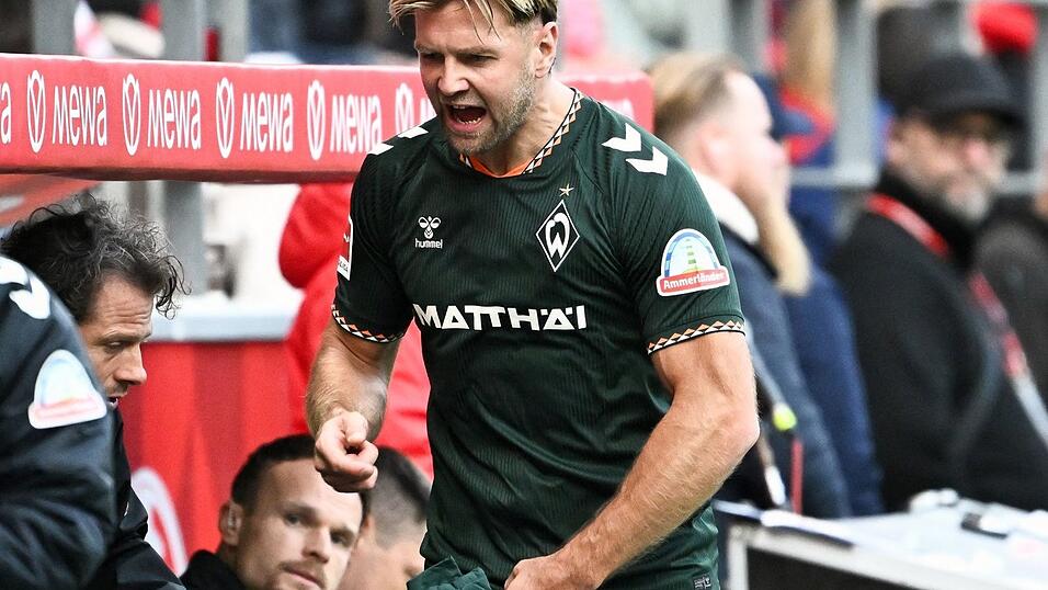Niclas Füllkrug sieht die Debatte um ein mögliches DFB-Comeback locker. Niclas Füllkrug sieht die Debatte um ein mögliches DFB-Comeback locker.