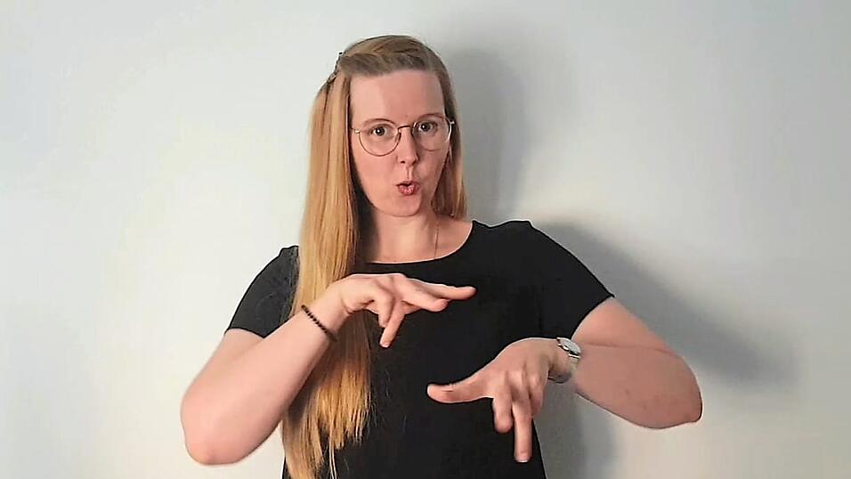 Als Gebärdensprachdolmetscherin übersetzt Kathleen Entrich in verschiedenen Situationen, um zwischen Hörenden und Gehörlosen zu vermitteln. Als Gebärdensprachdolmetscherin übersetzt Kathleen Entrich in verschiedenen Situationen, um zwischen Hörenden und Gehörlosen zu vermitteln.