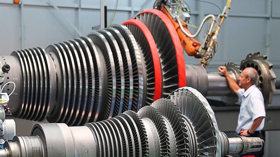 Eine offengelegte Dampfturbine liegt zur Wartung in einem Siemens-Werk. Siemens Energy ist für die nähere Zukunft zuversichtlich. Eine offengelegte Dampfturbine liegt zur Wartung in einem Siemens-Werk. Siemens Energy ist für die nähere Zukunft zuversichtlich.