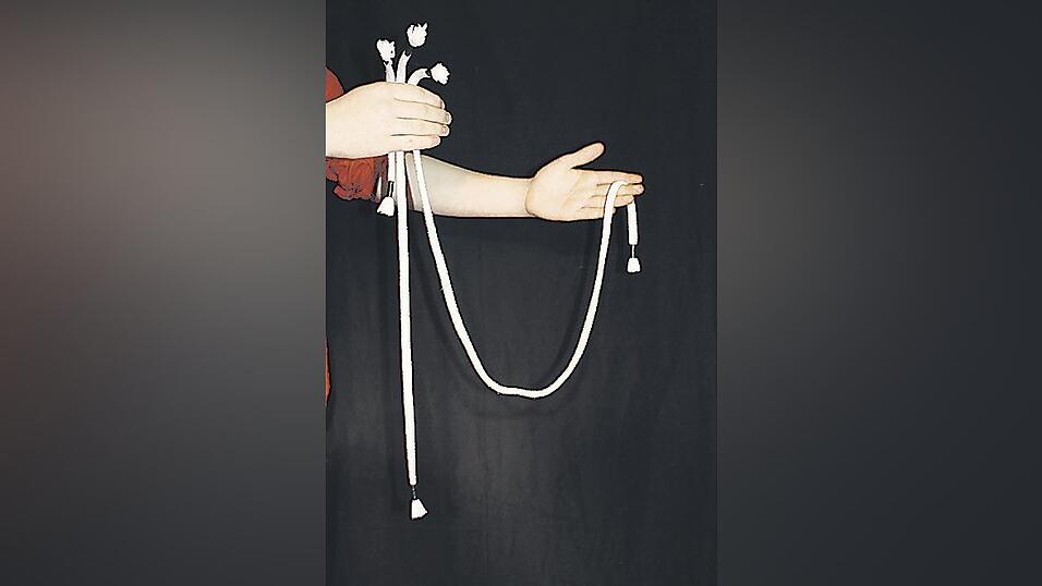 ...und ein langes Seil aus seiner Hand.
