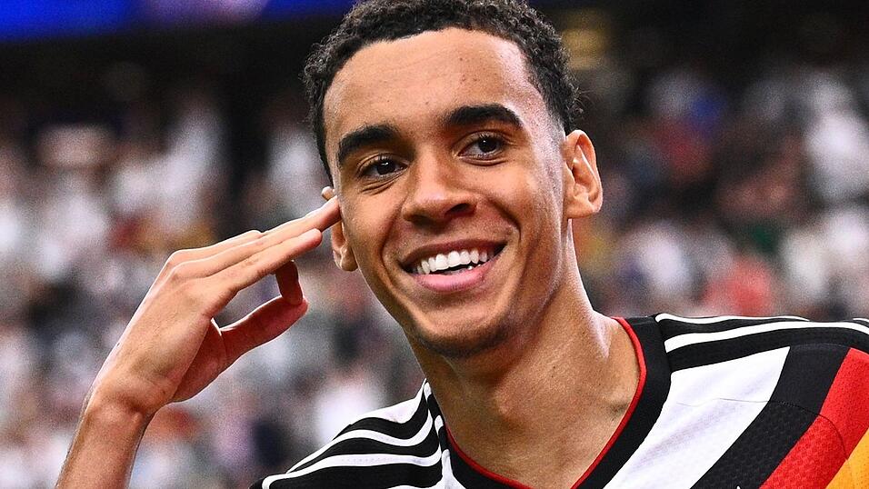 Ein strahlender Jamal Musiala beim besonderen WM-Comeback in den USA. Ein strahlender Jamal Musiala beim besonderen WM-Comeback in den USA.