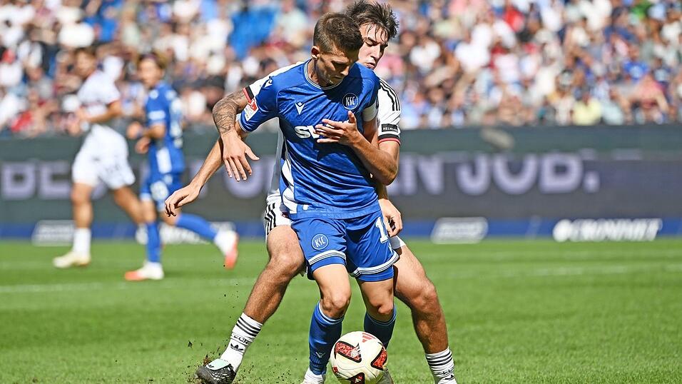 Eng bewacht: KSC-Spielmacher Marvin Wanitzek (vorn). Eng bewacht: KSC-Spielmacher Marvin Wanitzek (vorn).