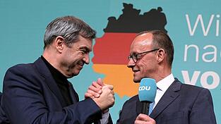 CDU-Chef Friedrich Merz (r.) kann jetzt endlich Bundeskanzler werden - aber der CSU-Vorsitzende Markus Söder (l.) wird bei der Regierungsbildung ein gehöriges Wörtchen mitreden.