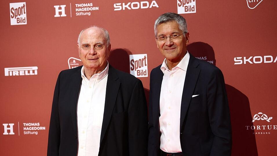Die Bayern-Granden Hoeneß und Hainer erwarten den FC Bayern wieder an der Tabellenspitze. (Archivbild) Die Bayern-Granden Hoeneß und Hainer erwarten den FC Bayern wieder an der Tabellenspitze. (Archivbild)