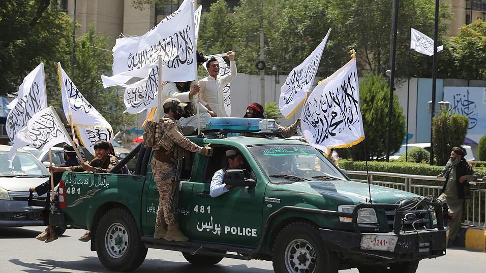 Für die militant-islamistischen Taliban ist der Jahrestag des Abzugs der US-geführten Truppen aus Afghanistan ein Grund zum Feiern. Für die militant-islamistischen Taliban ist der Jahrestag des Abzugs der US-geführten Truppen aus Afghanistan ein Grund zum Feiern.